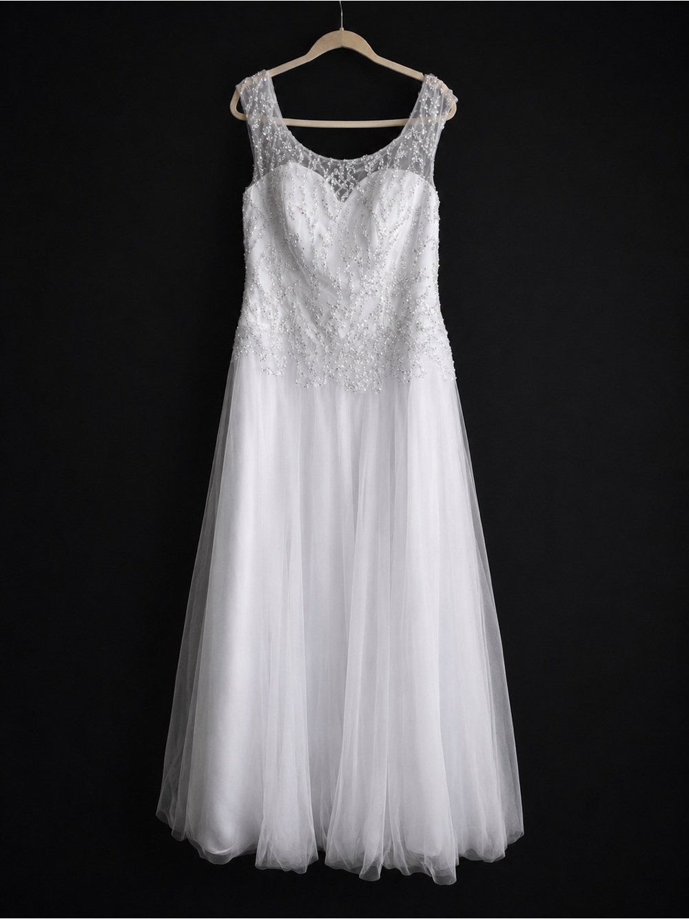 White Beaded Tulle Wedding Gown with Illusion Neckline. Floor length.